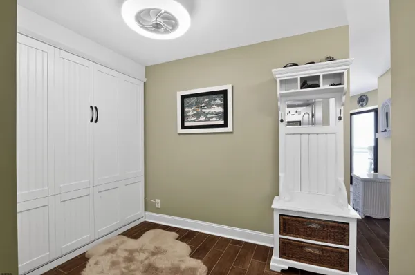 a view of livingroom with hardwood floor and hallway