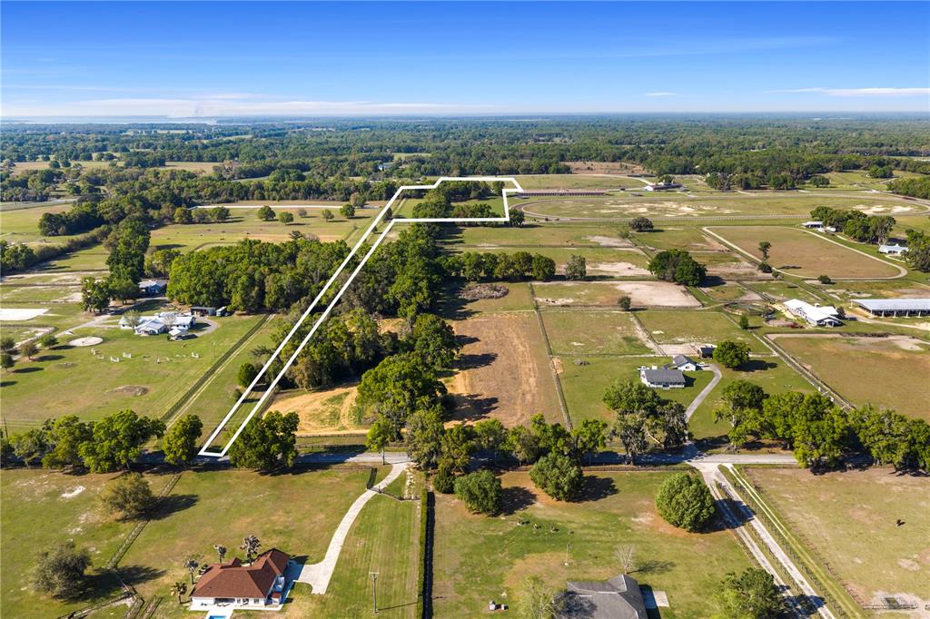 1150 Northeast 155th Place Citra, FL 32113 - Photo 11 of 17 an aerial view of residential houses with outdoor space