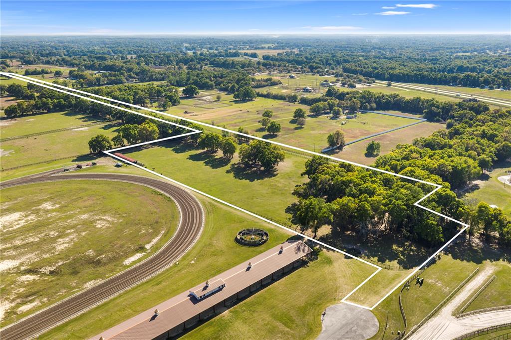 1150 Northeast 155th Place Citra, FL 32113 - Photo 8 of 17 a view of a tennis court