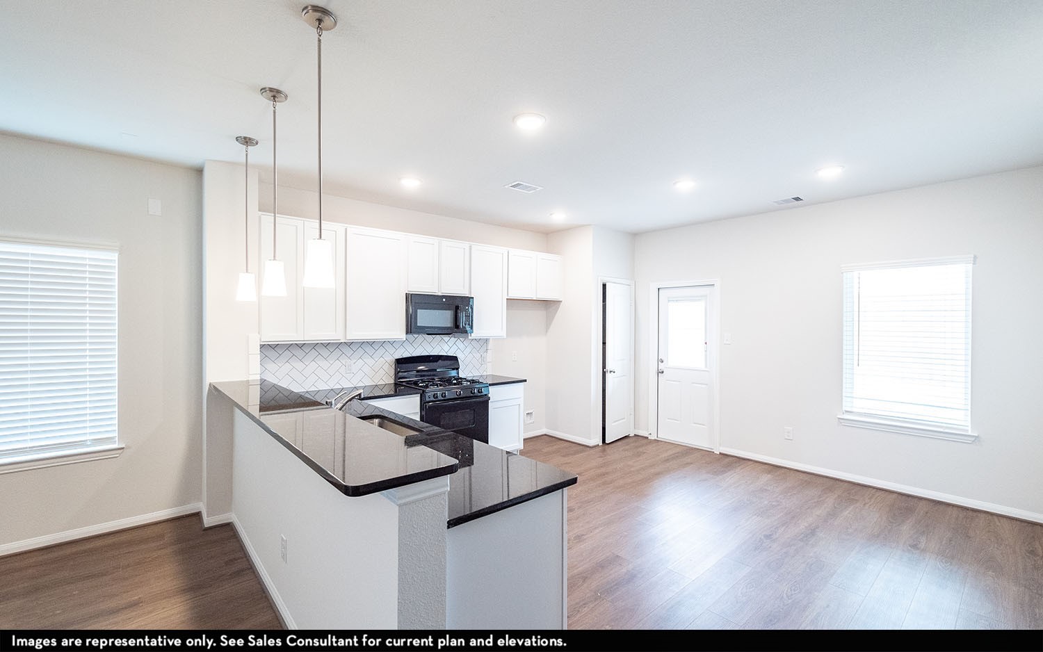 3527 Prairie Rose Trail Angleton, TX 77515 - Photo 9 of 13 a kitchen with stainless steel appliances granite countertop a sink stove and refrigerator
