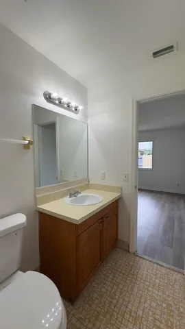 a bathroom with a sink and a toilet