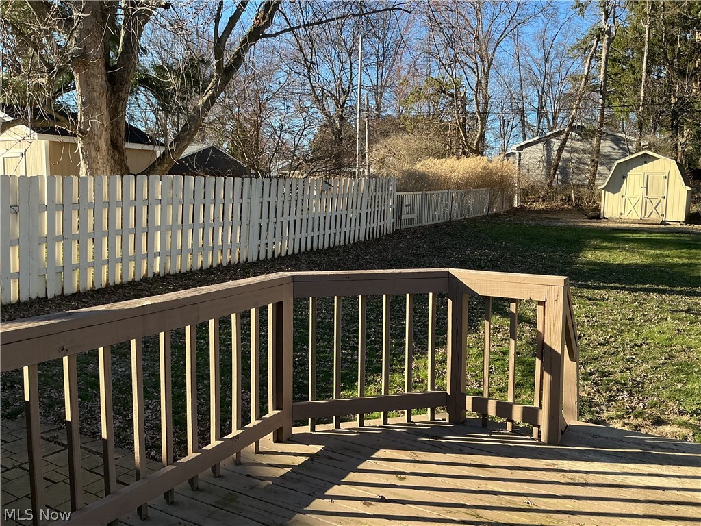 1850 Merle Road Salem, OH 44460 - Photo 33 of 35 Wooden terrace with a fenced backyard and a storage shed