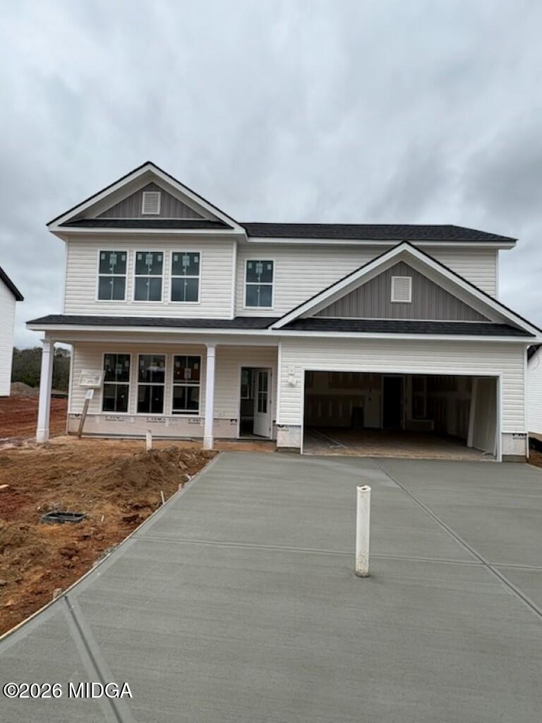 127 Bramblewood Lane Perry, GA 31069 - Photo 2 of 32 a front view of a house with a yard