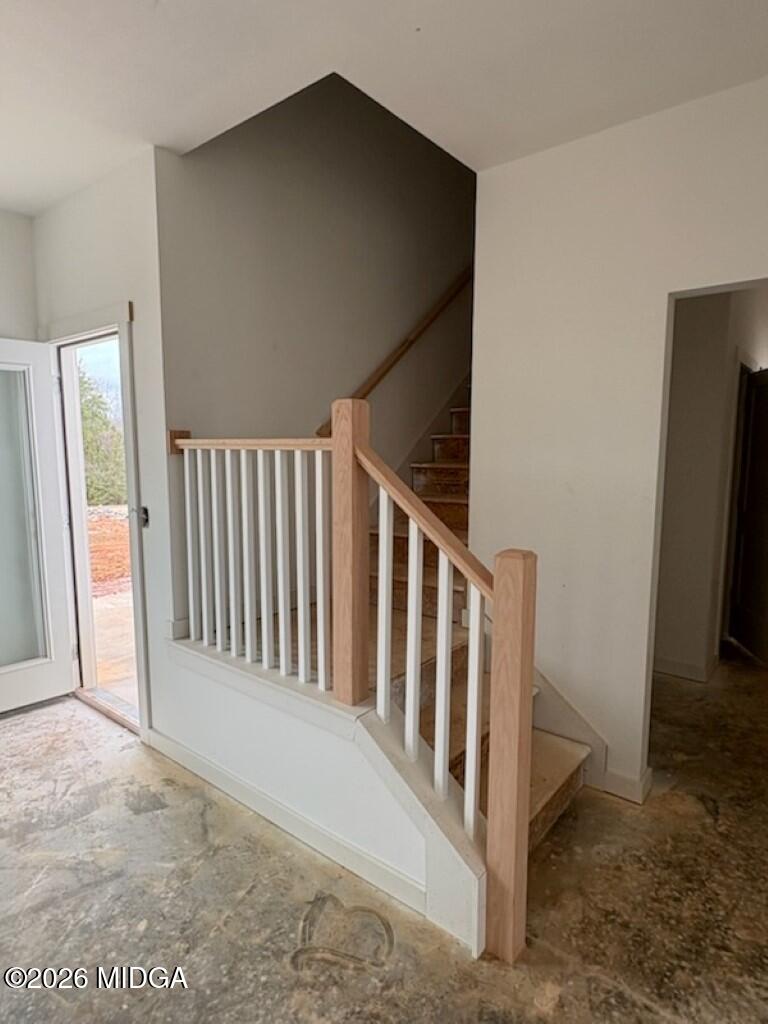 127 Bramblewood Lane Perry, GA 31069 - Photo 5 of 32 a view of a hallway with staircase