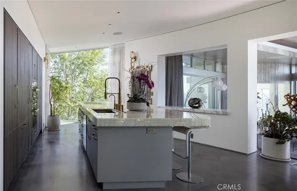 a dining room with table and chairs