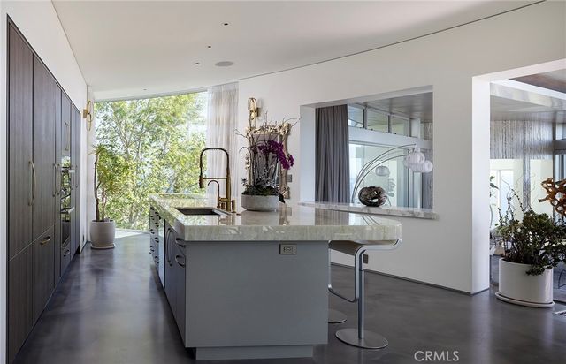 a dining room with table and chairs