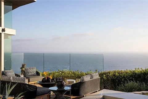 a outdoor living space with furniture and city view