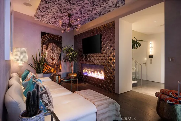 a bedroom with bed and a fireplace