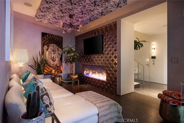 a bedroom with bed and a fireplace
