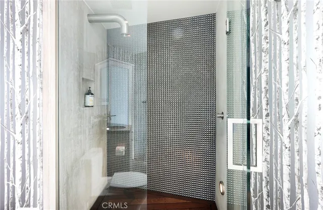 a bathroom with a sink and shower