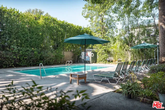 a bathroom with a shower and a toilet