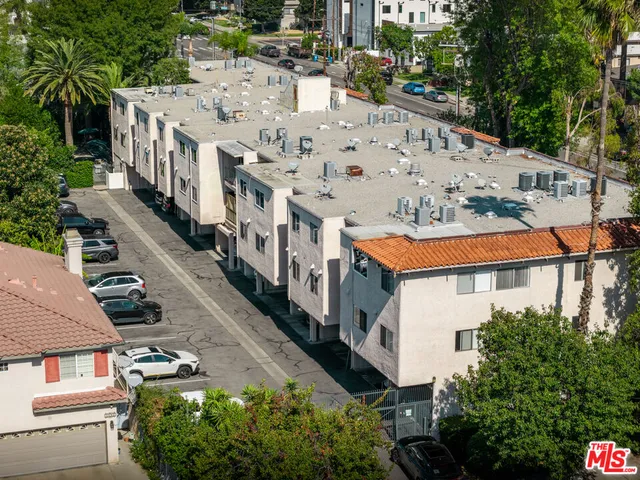 a view of a house with a street