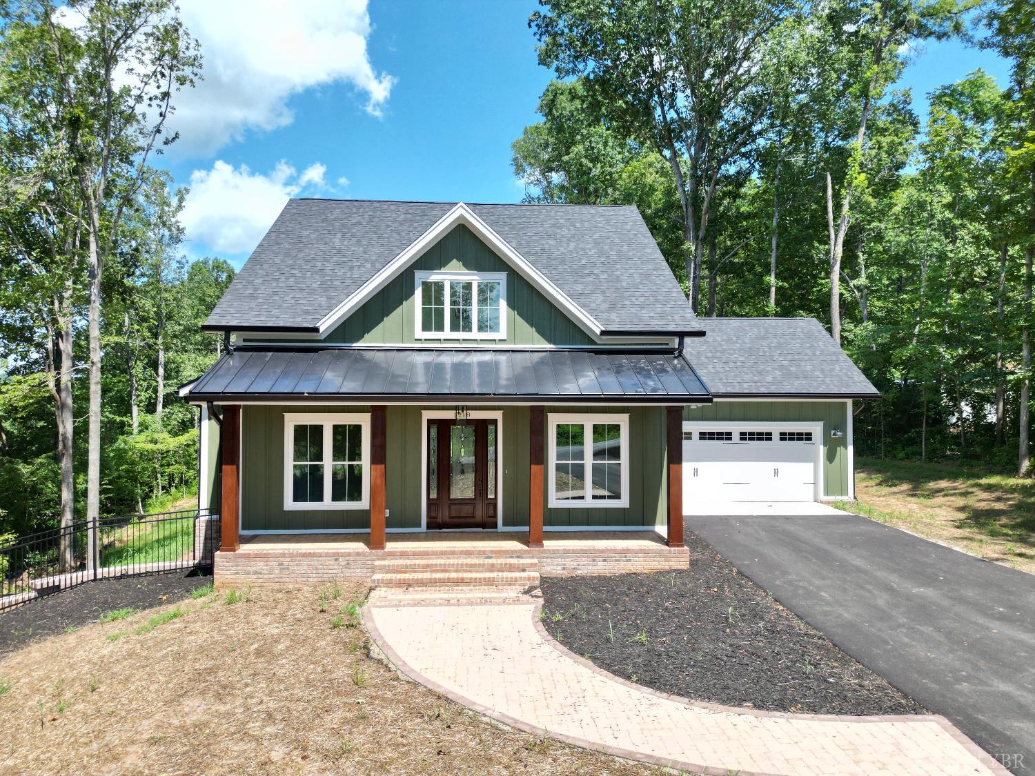 1218 Morgans Church Road Bedford, VA 24523 - Photo 2 of 53 a front view of a house with a yard