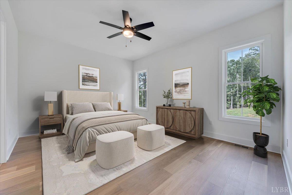 1218 Morgans Church Road Bedford, VA 24523 - Photo 22 of 53 a bedroom with a large bed and a window