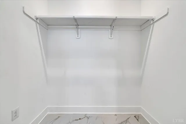 a view of small space with racks on the wall