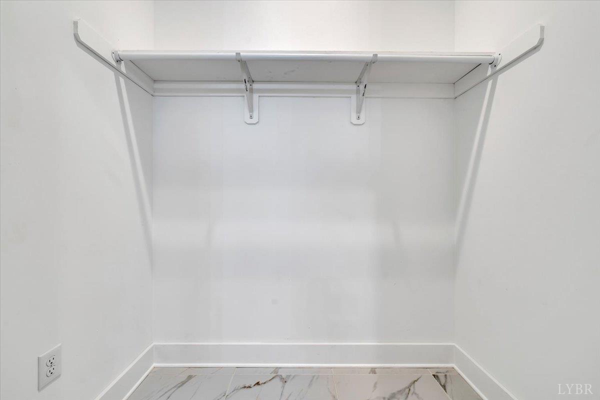 1218 Morgans Church Road Bedford, VA 24523 - Photo 26 of 53 a view of small space with racks on the wall