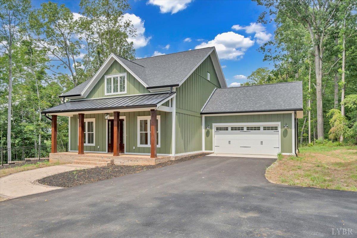 1218 Morgans Church Road Bedford, VA 24523 - Photo 51 of 53 a front view of a house with garden