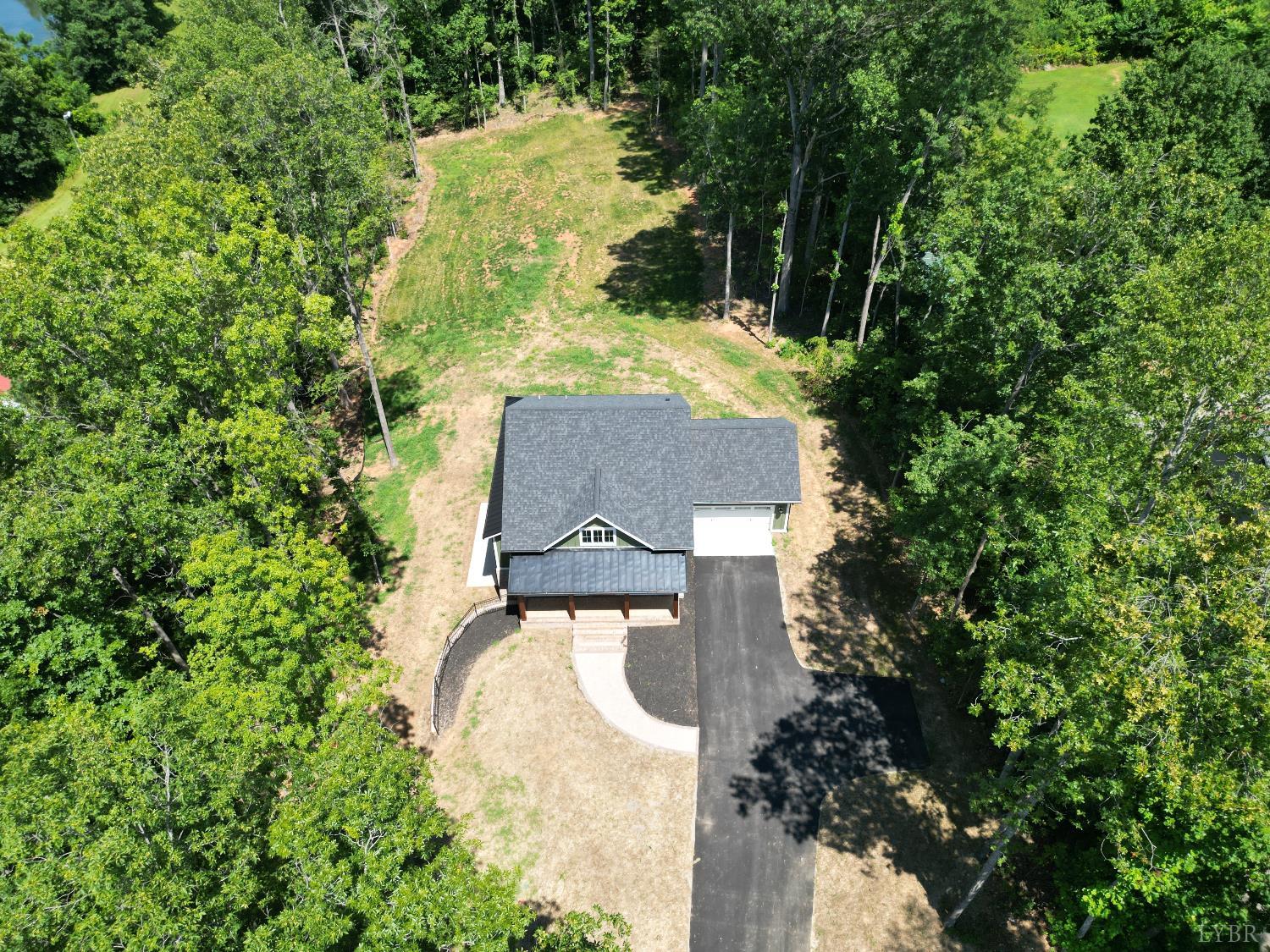 1218 Morgans Church Road Bedford, VA 24523 - Photo 53 of 53 an aerial view of a house with outdoor space and trees all around