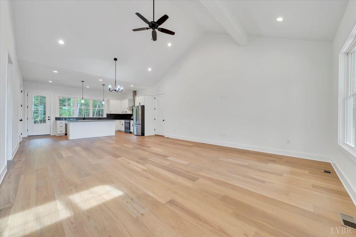 1218 Morgans Church Road Bedford, VA 24523 - Photo 7 of 53 a view of a kitchen with a sink and a stove