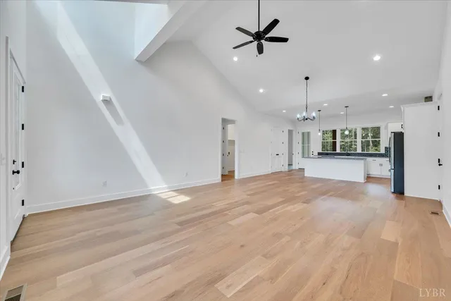 a view of large windows in an empty room