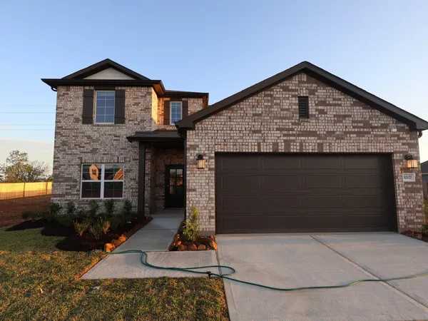 a front view of a house with entertaining space
