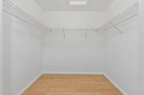 a view of a room with shelf on the wall