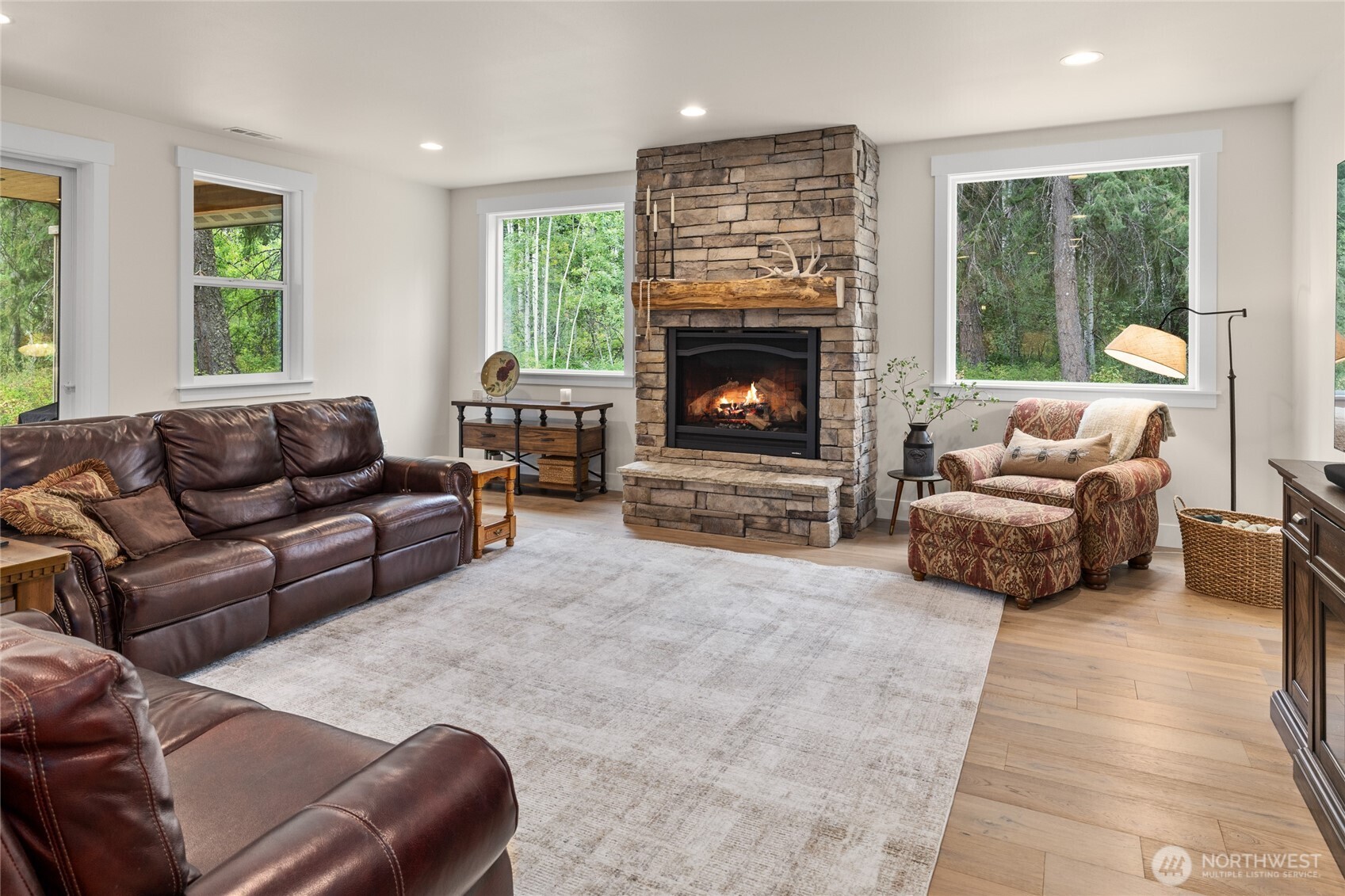 1111 Old Cedars Road Cle Elum, WA 98922 - Photo 14 of 31 a living room with furniture and a fireplace