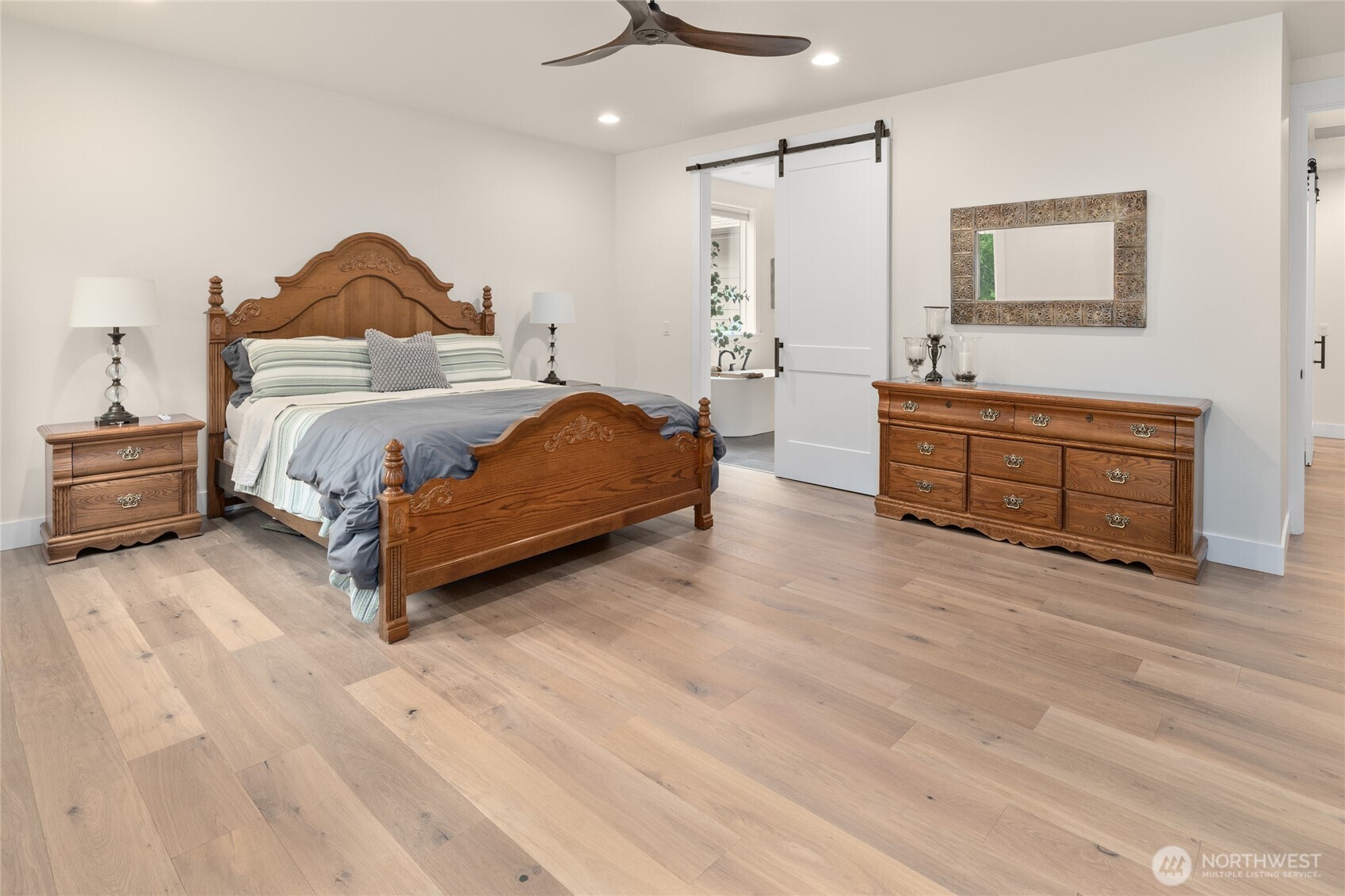 1111 Old Cedars Road Cle Elum, WA 98922 - Photo 18 of 31 a spacious bedroom with a bed and a dresser