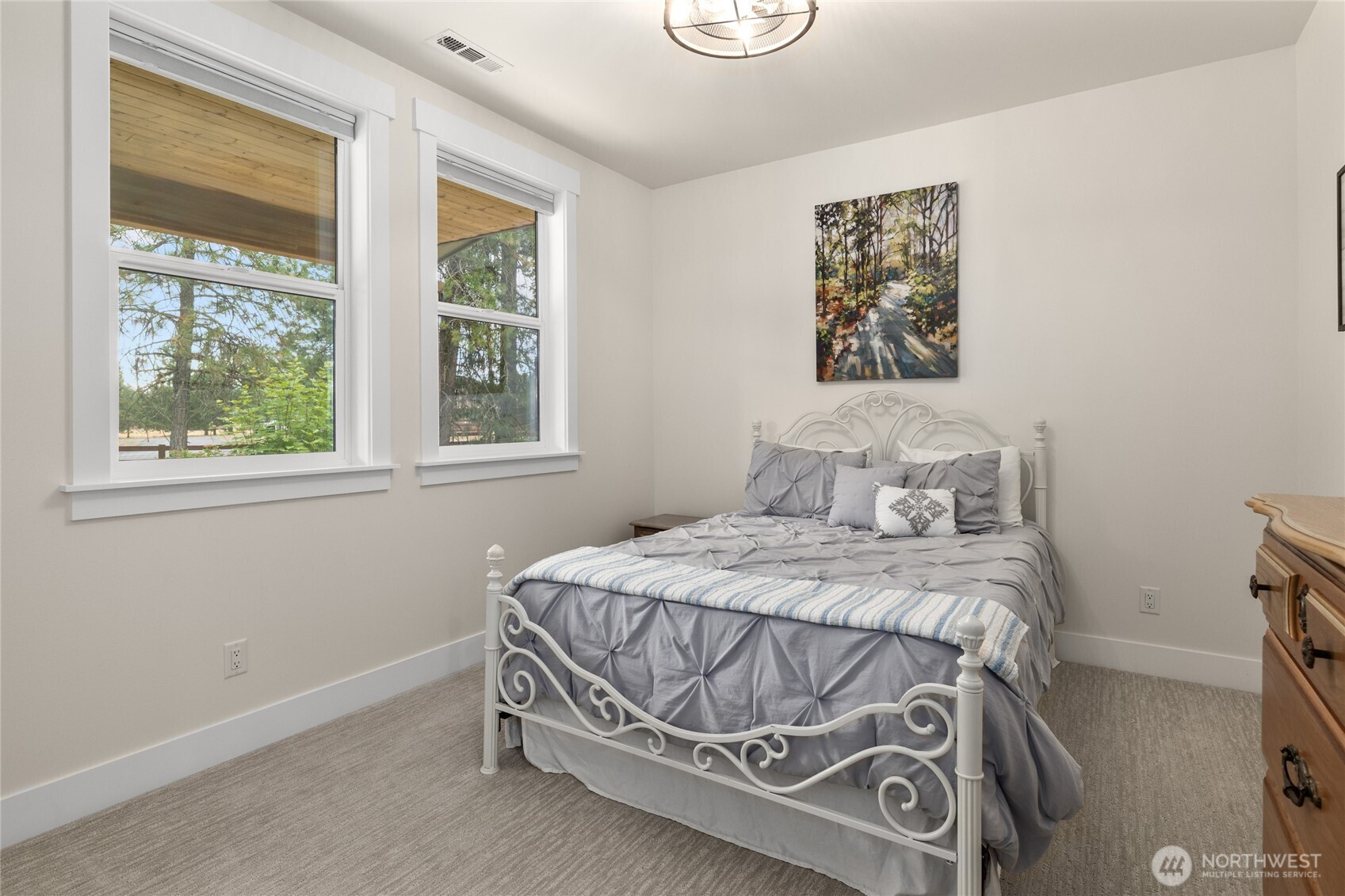 1111 Old Cedars Road Cle Elum, WA 98922 - Photo 22 of 31 a bedroom with a bed and a window