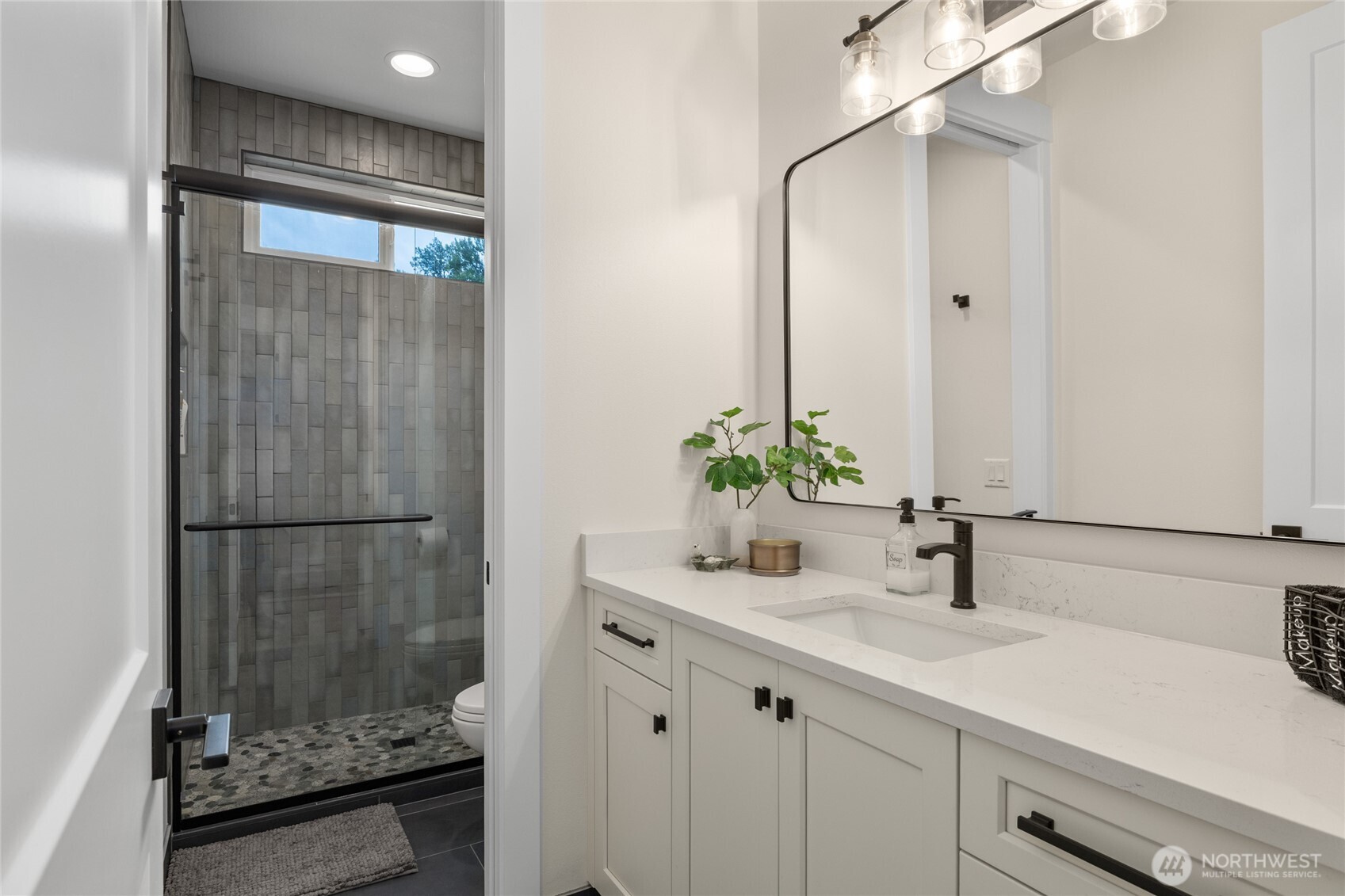 1111 Old Cedars Road Cle Elum, WA 98922 - Photo 23 of 31 a bathroom with a sink and a mirror