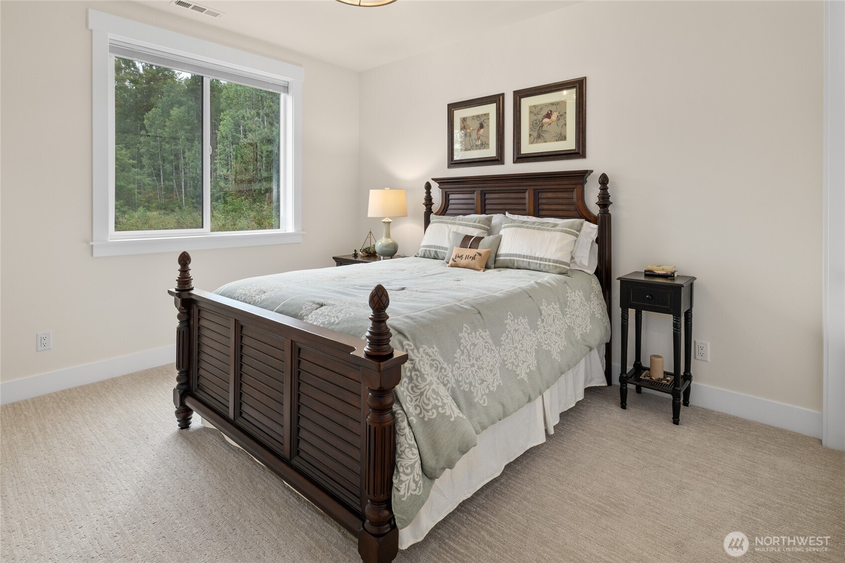 1111 Old Cedars Road Cle Elum, WA 98922 - Photo 24 of 31 a bedroom with a bed and a table