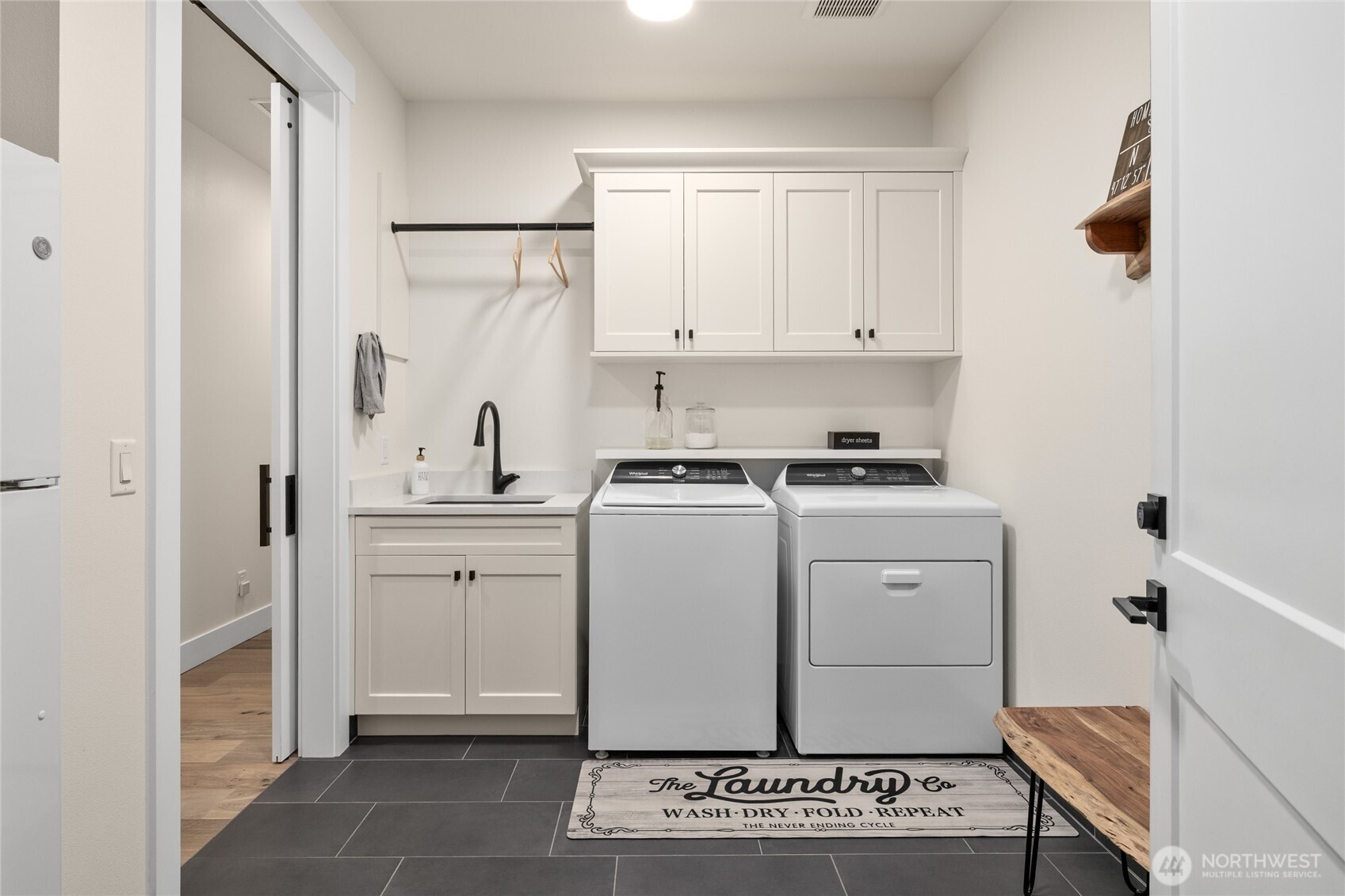 1111 Old Cedars Road Cle Elum, WA 98922 - Photo 25 of 31 a room with a white cabinets and white appliances