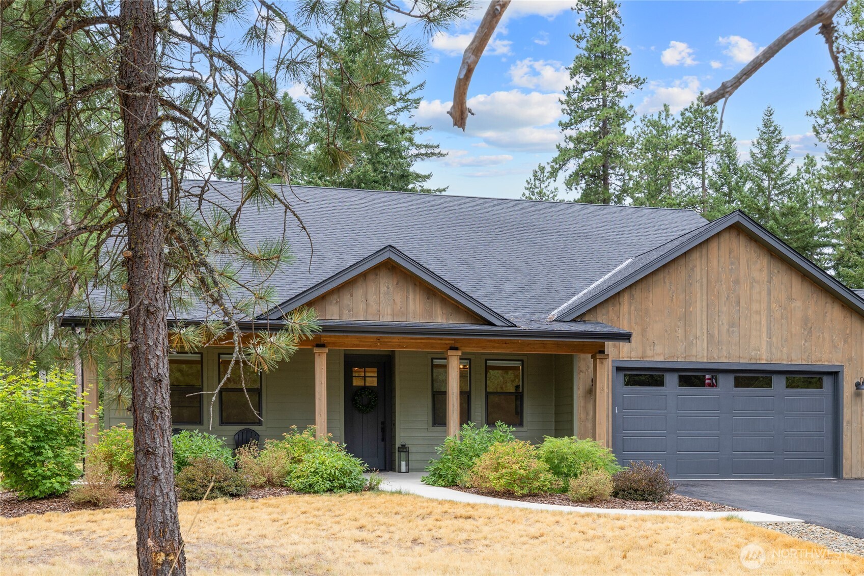 1111 Old Cedars Road Cle Elum, WA 98922 - Photo 29 of 31 a view of a house with a yard plants and large tree