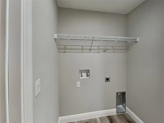 a view of a room with racks on the wall