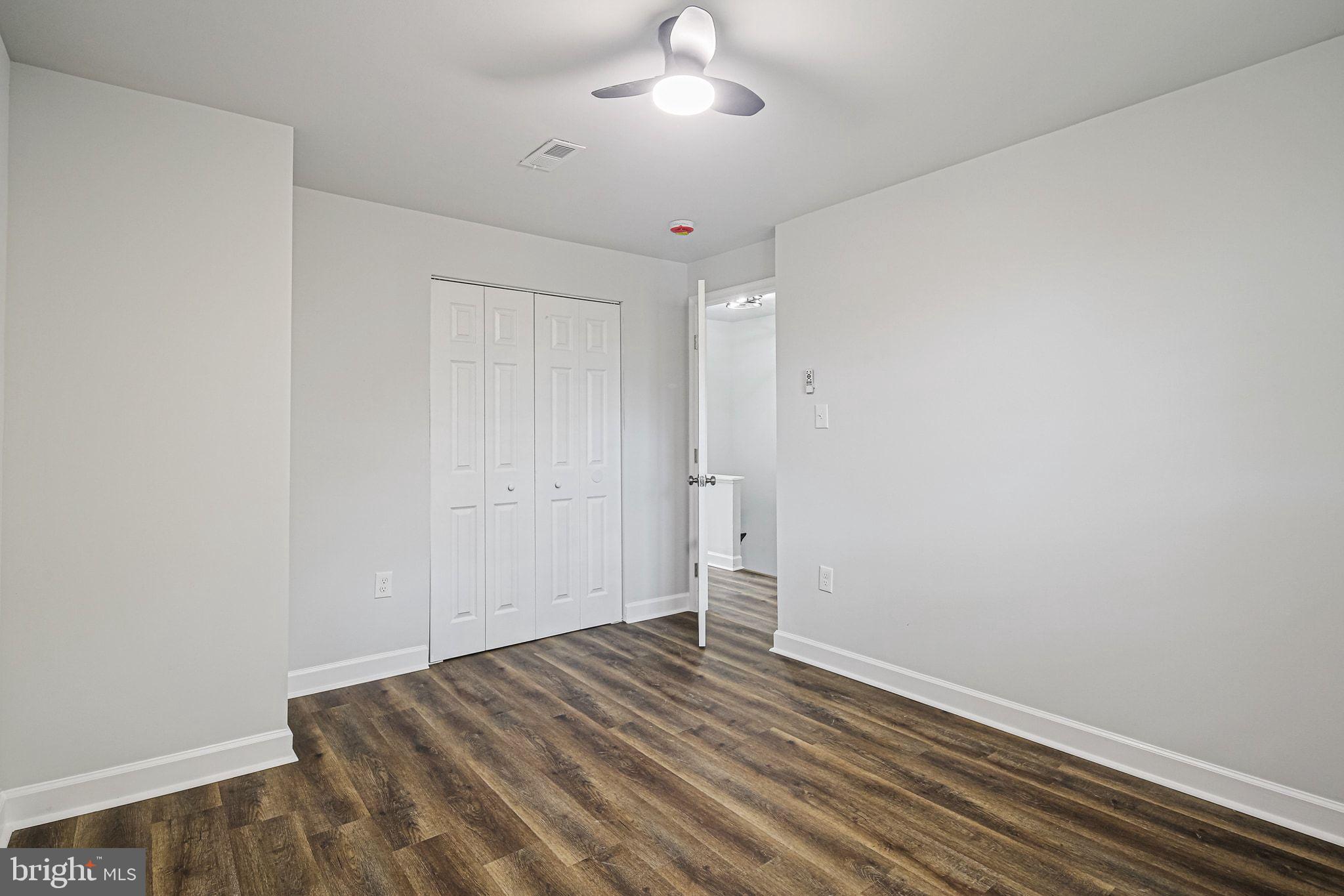 4702 Vancouver Road Baltimore, MD 21229 - Photo 18 of 33 wooden floor in an empty room