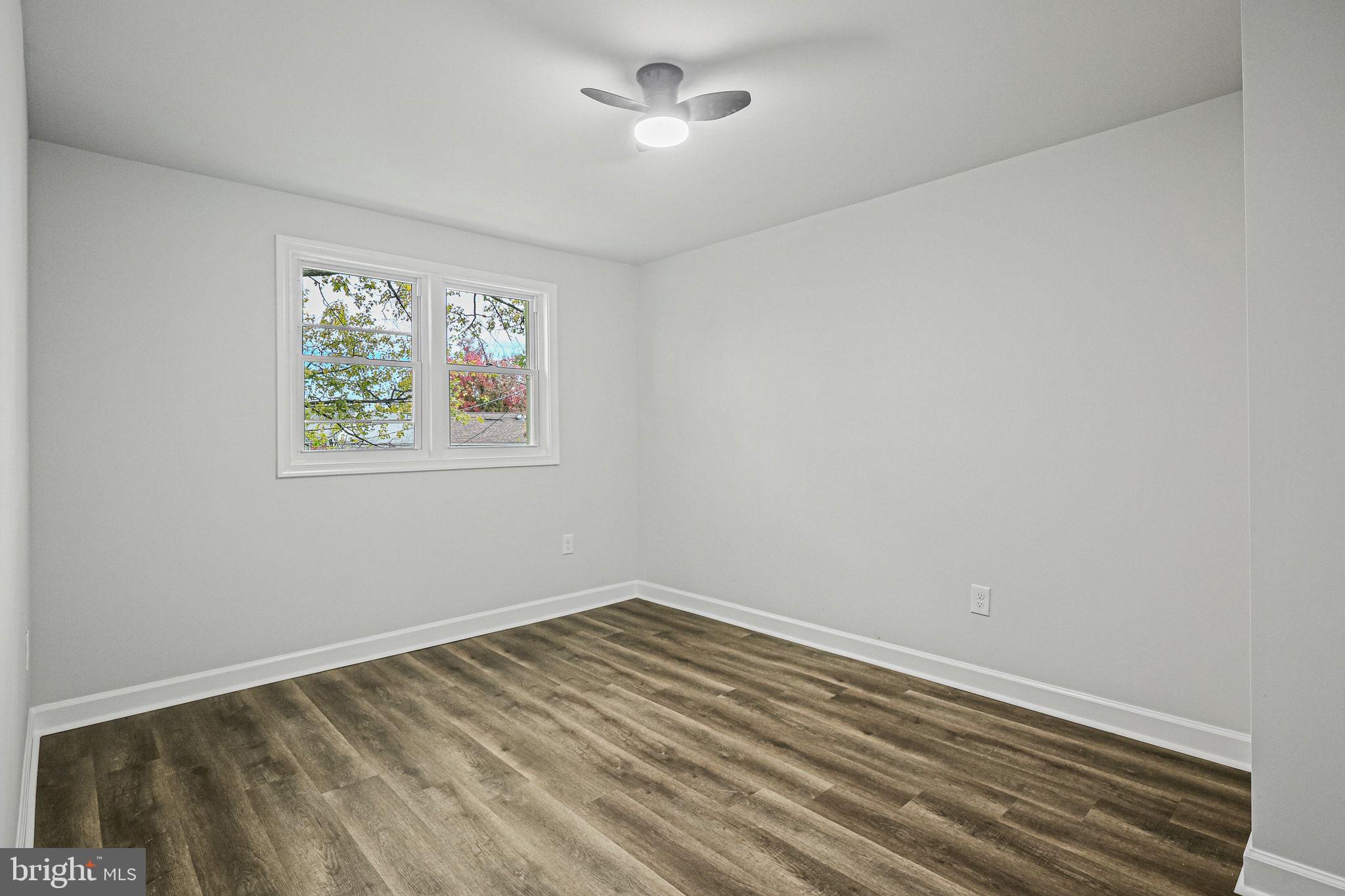 4702 Vancouver Road Baltimore, MD 21229 - Photo 20 of 33 a view of room with window and ceiling fan