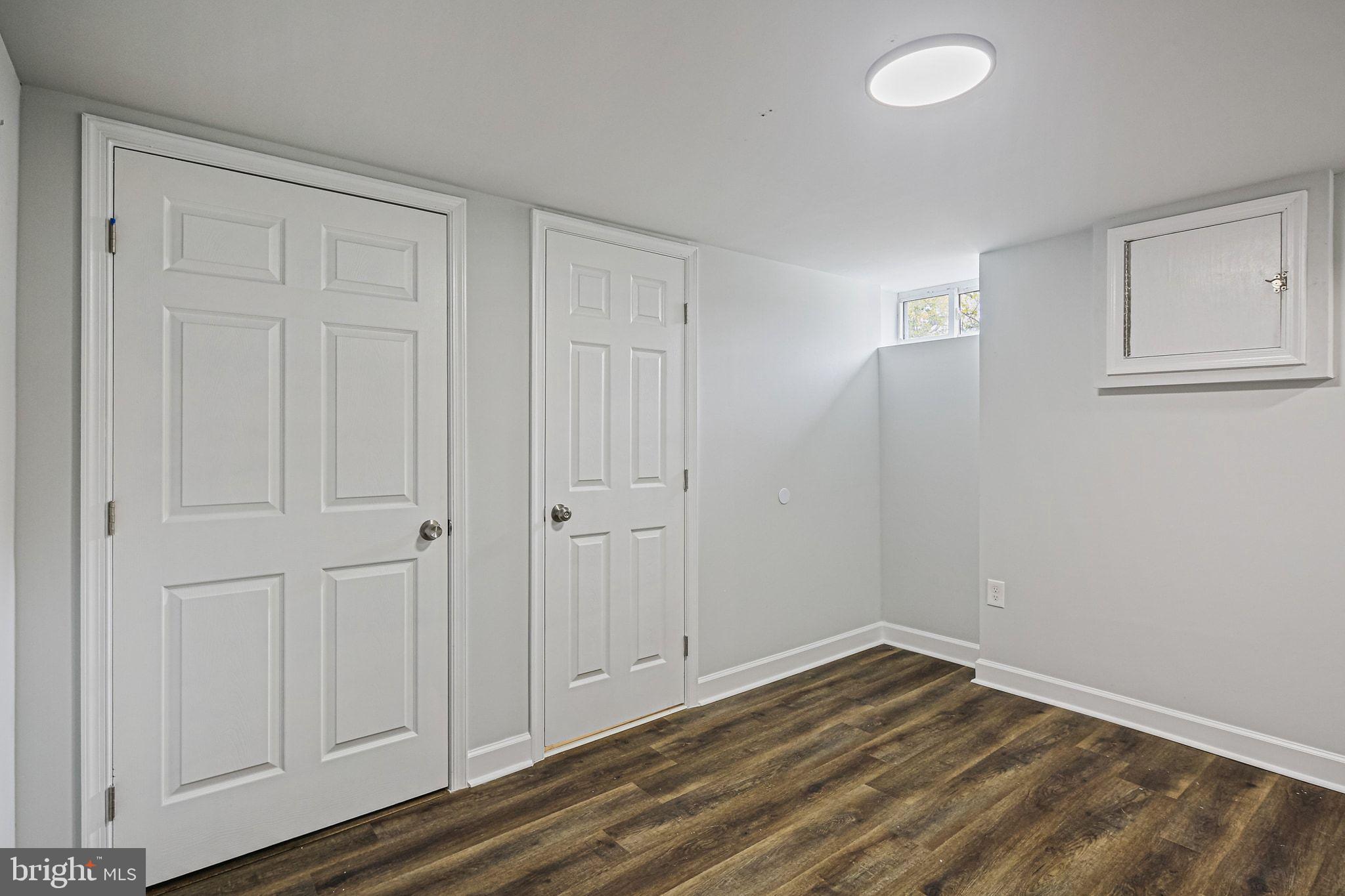 4702 Vancouver Road Baltimore, MD 21229 - Photo 24 of 33 a view of empty room with wooden floor