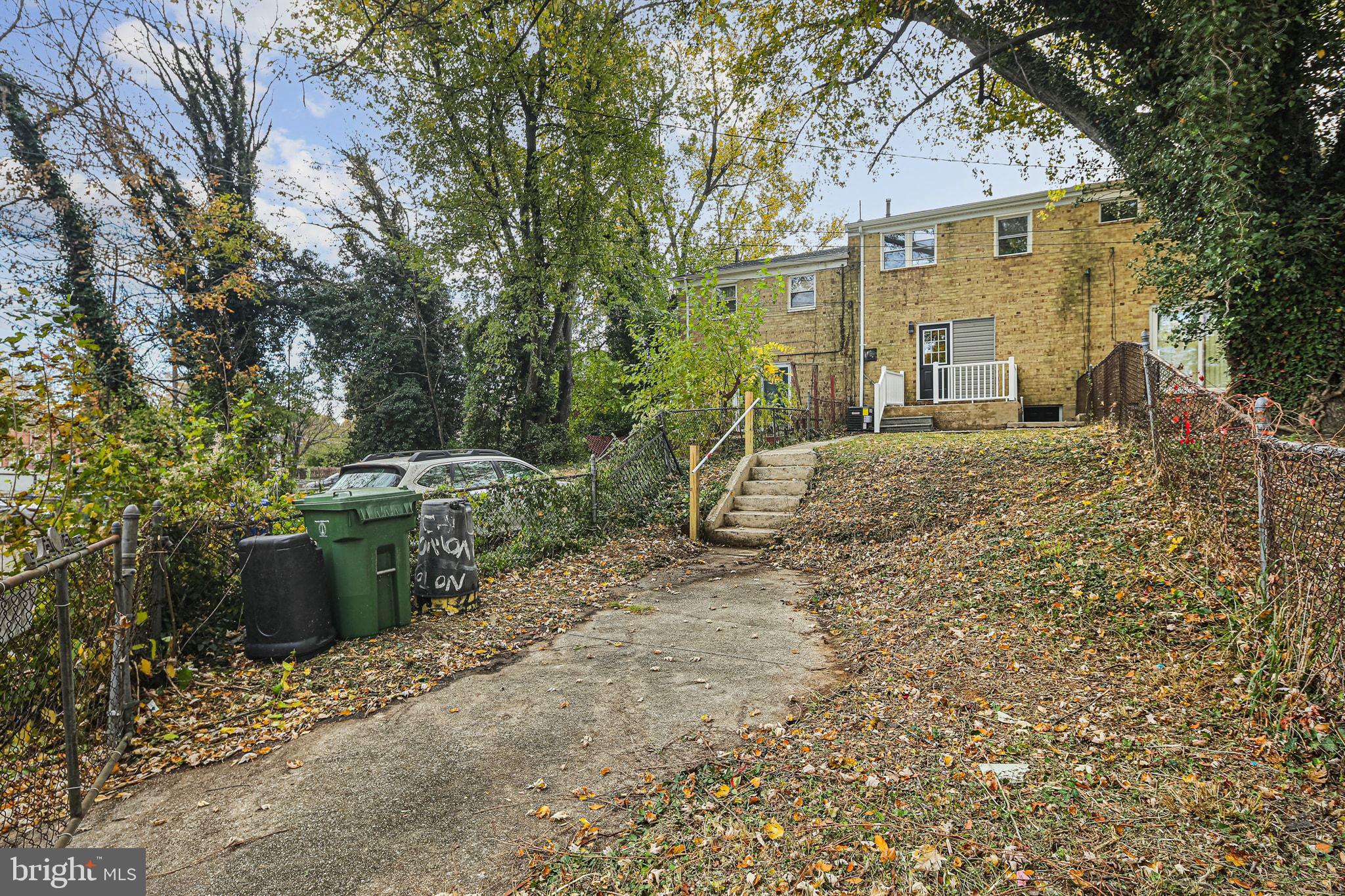 4702 Vancouver Road Baltimore, MD 21229 - Photo 31 of 33 a view of a front of a house with a yard