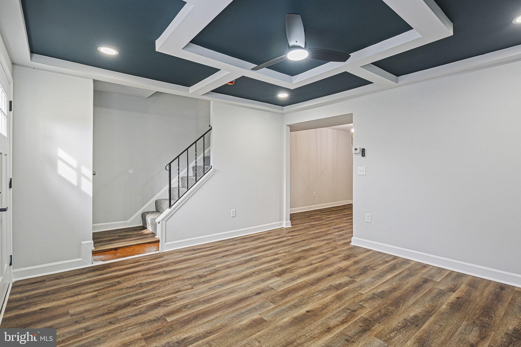 4702 Vancouver Road Baltimore, MD 21229 - Photo 6 of 33 a view of entryway and hall with wooden floor