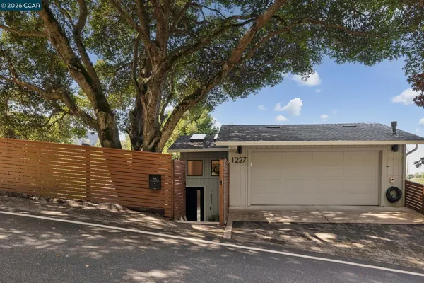 a front view of house with yard