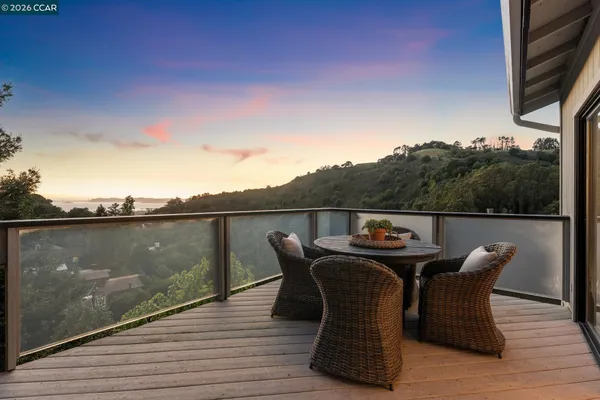 a view of a two chair in a balcony