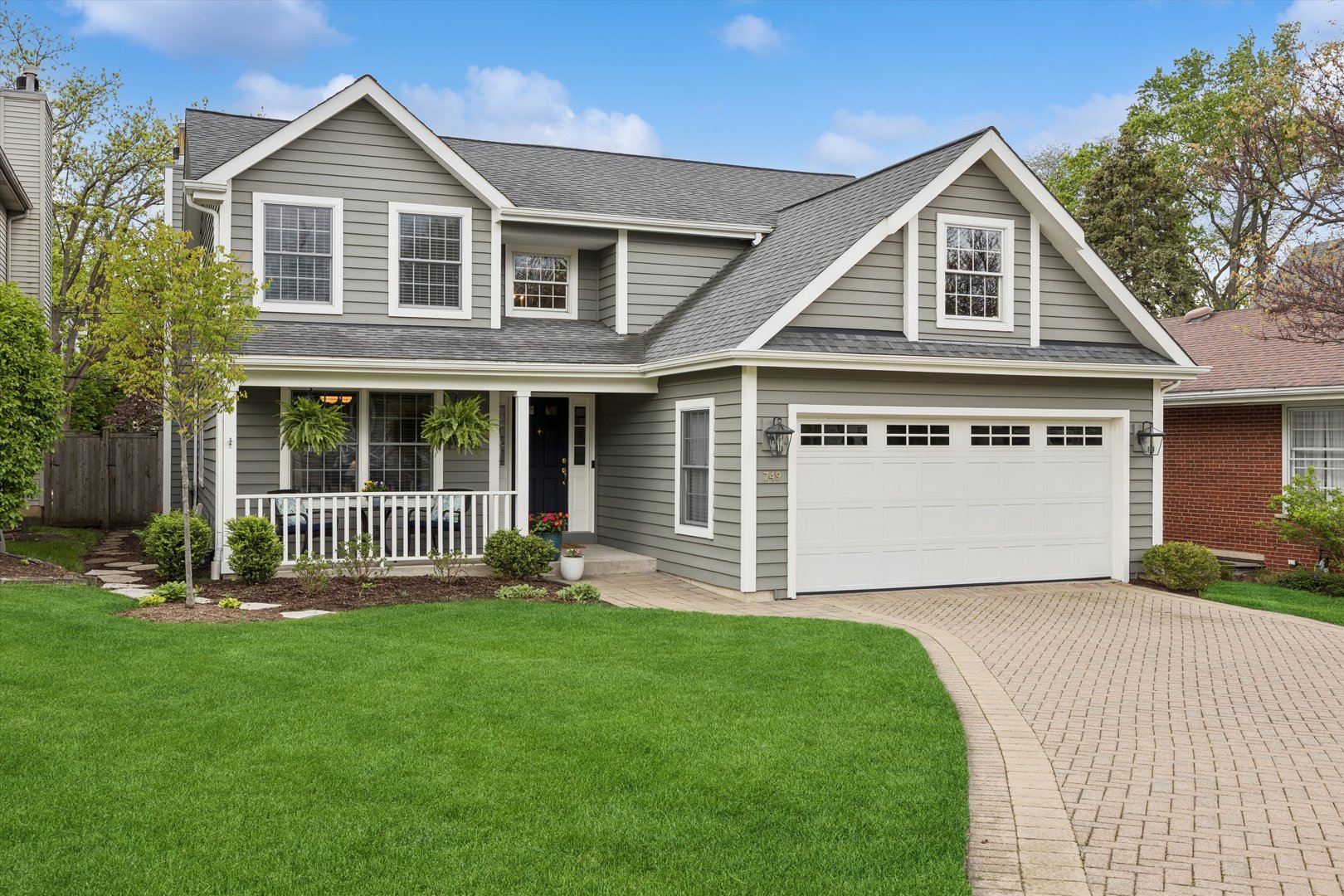 749 Summit Street Downers Grove, IL 60515 - Photo 1 of 32 a front view of a house with a yard