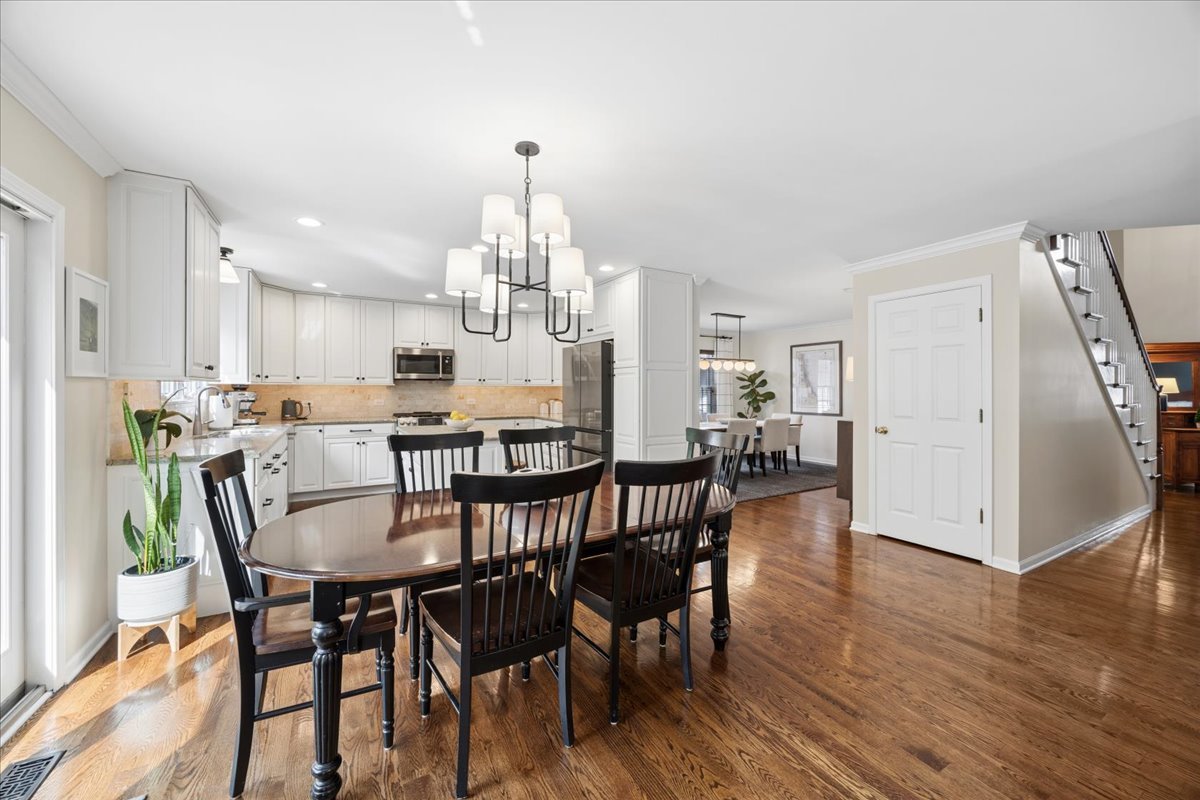 749 Summit Street Downers Grove, IL 60515 - Photo 11 of 32 a view of a dining room with furniture and wooden floor