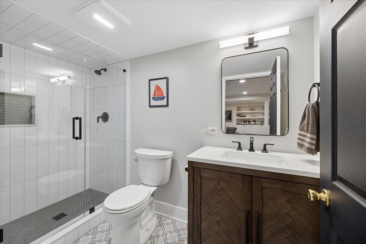 749 Summit Street Downers Grove, IL 60515 - Photo 26 of 32 a bathroom with a sink toilet and shower