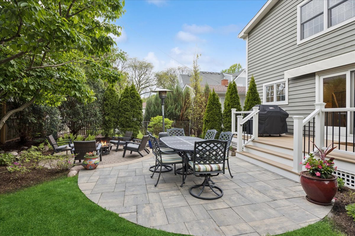 749 Summit Street Downers Grove, IL 60515 - Photo 29 of 32 a view of a patio with dining table and chairs