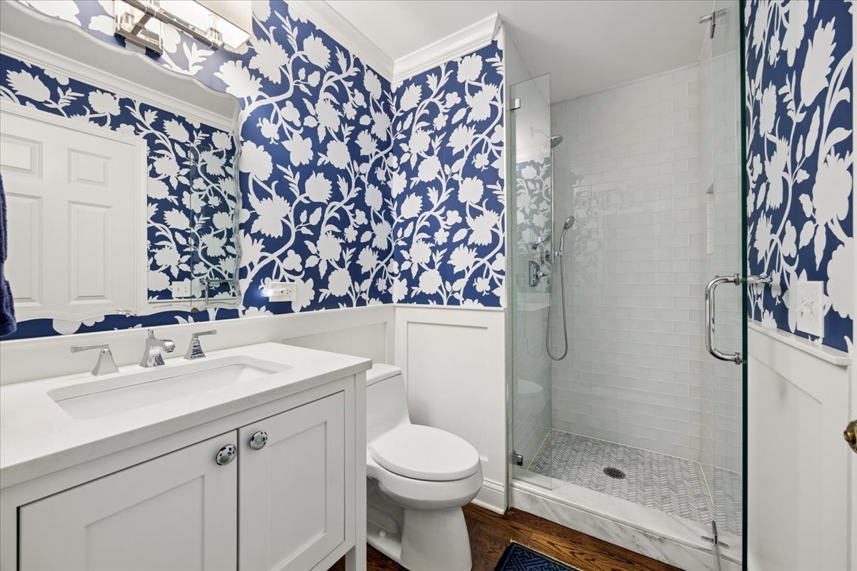 749 Summit Street Downers Grove, IL 60515 - Photo 6 of 32 a bathroom with a sink toilet and shower