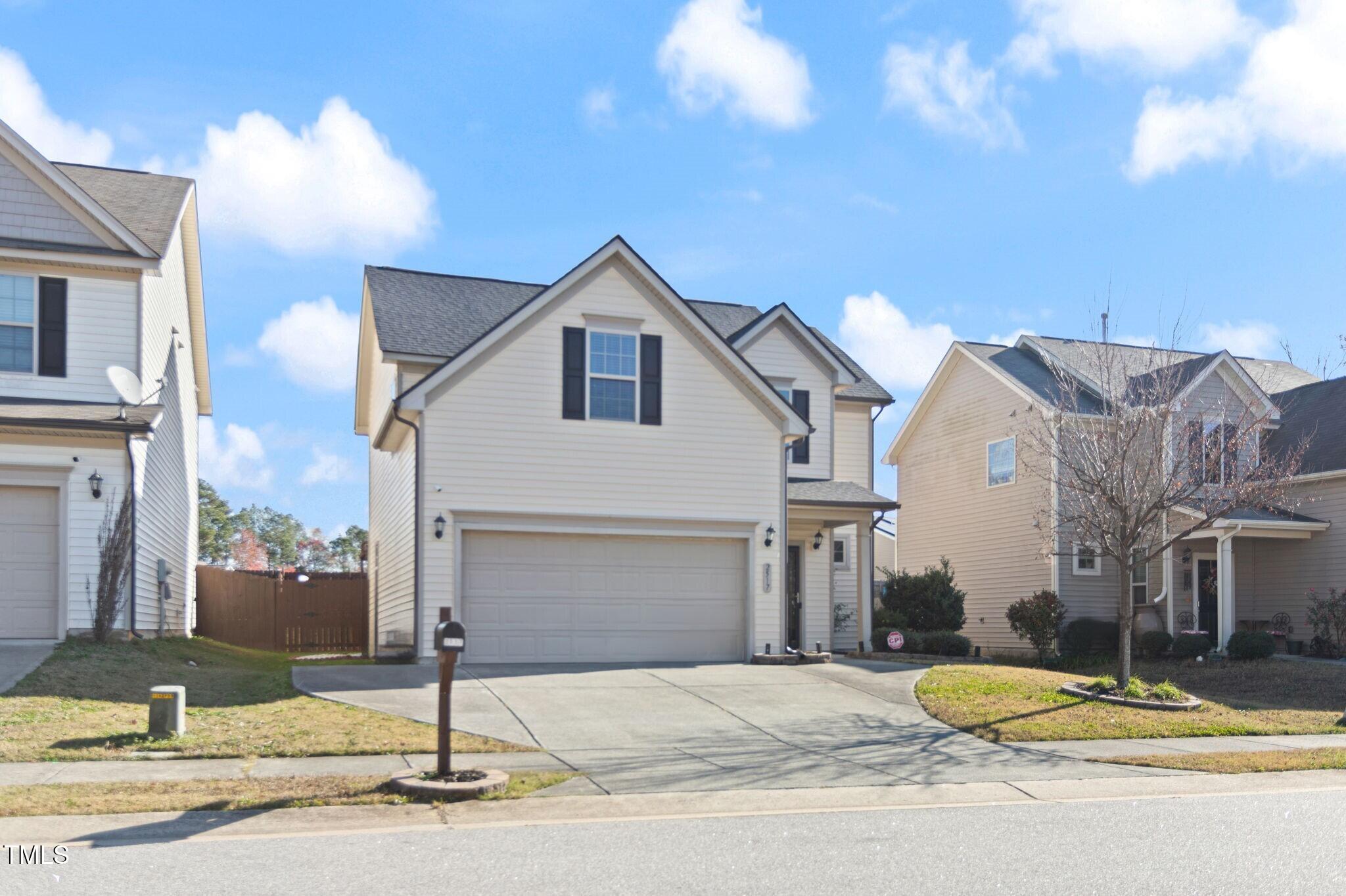 2517 Shepherd Valley Street Raleigh, NC 27610 - Photo 1 of 29 a front view of a house with a yard