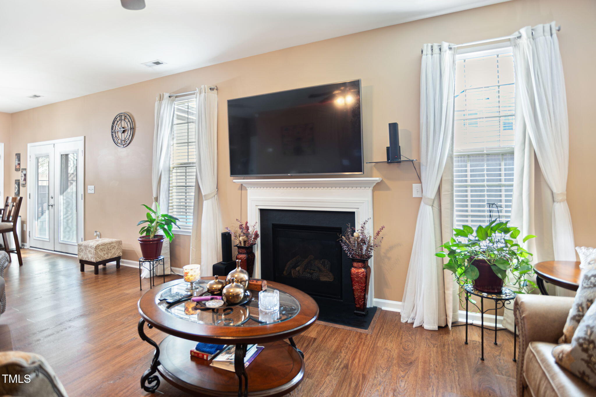 2517 Shepherd Valley Street Raleigh, NC 27610 - Photo 3 of 29 a living room with furniture and a fireplace