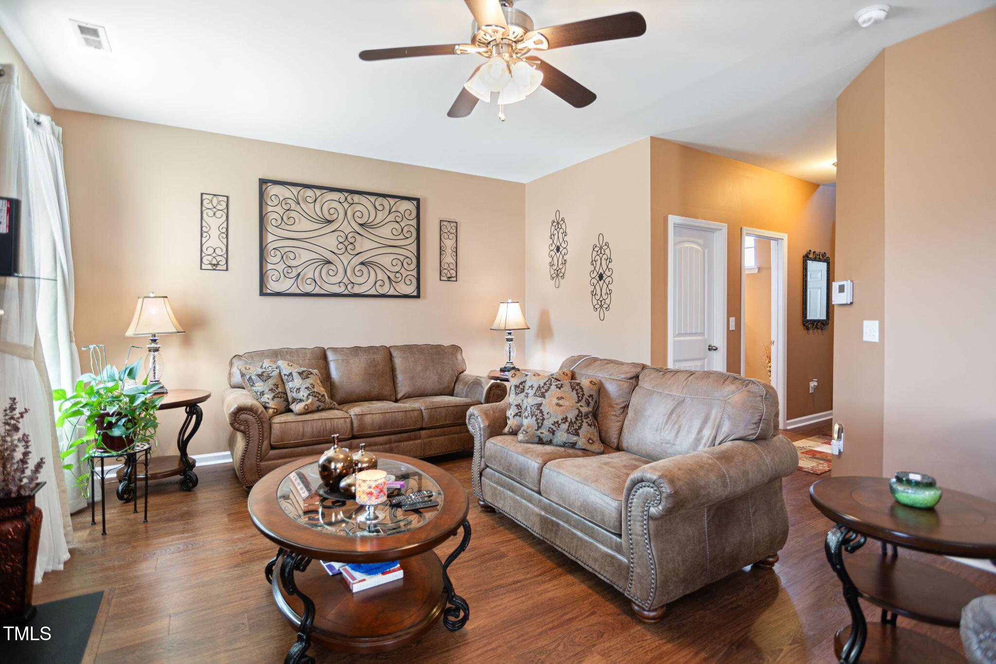 2517 Shepherd Valley Street Raleigh, NC 27610 - Photo 4 of 29 a living room with furniture and a large window