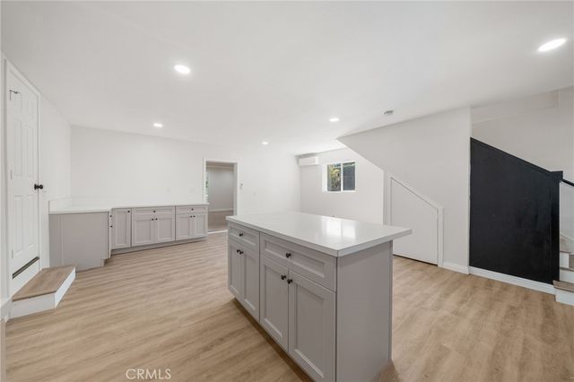 a view of a kitchen with a sink